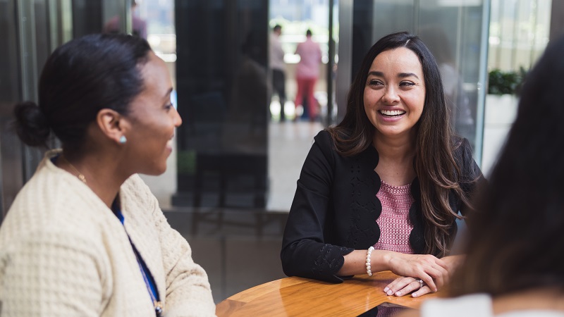 2 employees talking